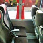 Touring Bus with reclining seats and arm rests